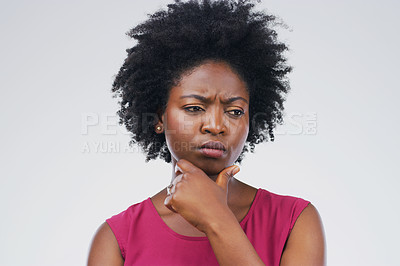 Buy stock photo Doubt, thinking and black woman in studio with frown, decision or choice on grey background space. Confused, suspicious and African female person concerned, questions or planning and solution emoji