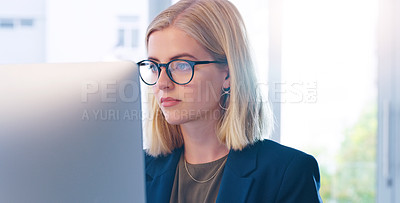 Buy stock photo Serious, glasses and computer for working, woman and vision for typing, job and receptionist in agency. Secretary, laptop and internet in workplace, email and schedule of company by female employee
