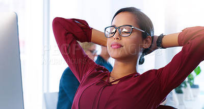 Buy stock photo Relax, computer and a business woman done with her tasks for the day in an office with hands behind her head. Resting, flare and complete with a young female employee working online using a desktop