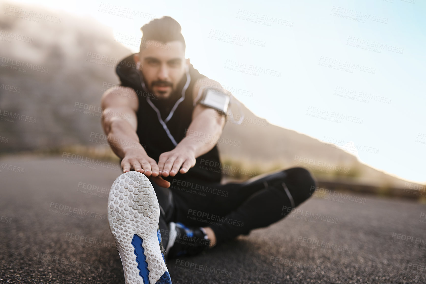 Buy stock photo Stretching, warm up and fitness for legs, outdoor and training on road, flexibility and exercise for man. Ground, workout and preparation for sport, athlete and performance of person and wellness