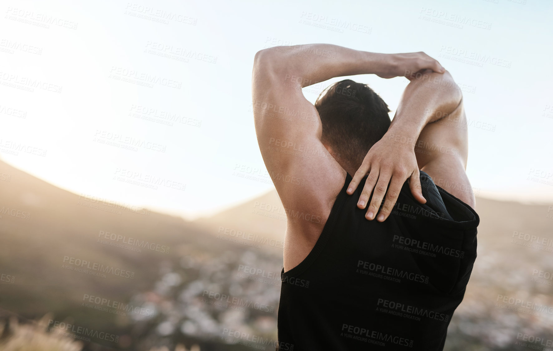 Buy stock photo Fitness, nature and man stretching arms for running exercise for race training by outdoor mountain. Sports, health and back of male athlete with muscle warm up for cardio workout with wellness.