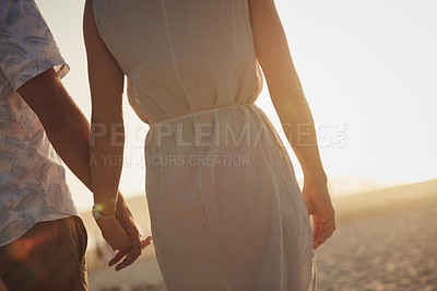 Buy stock photo Cropped shot of an unrecognizable couple holding hands