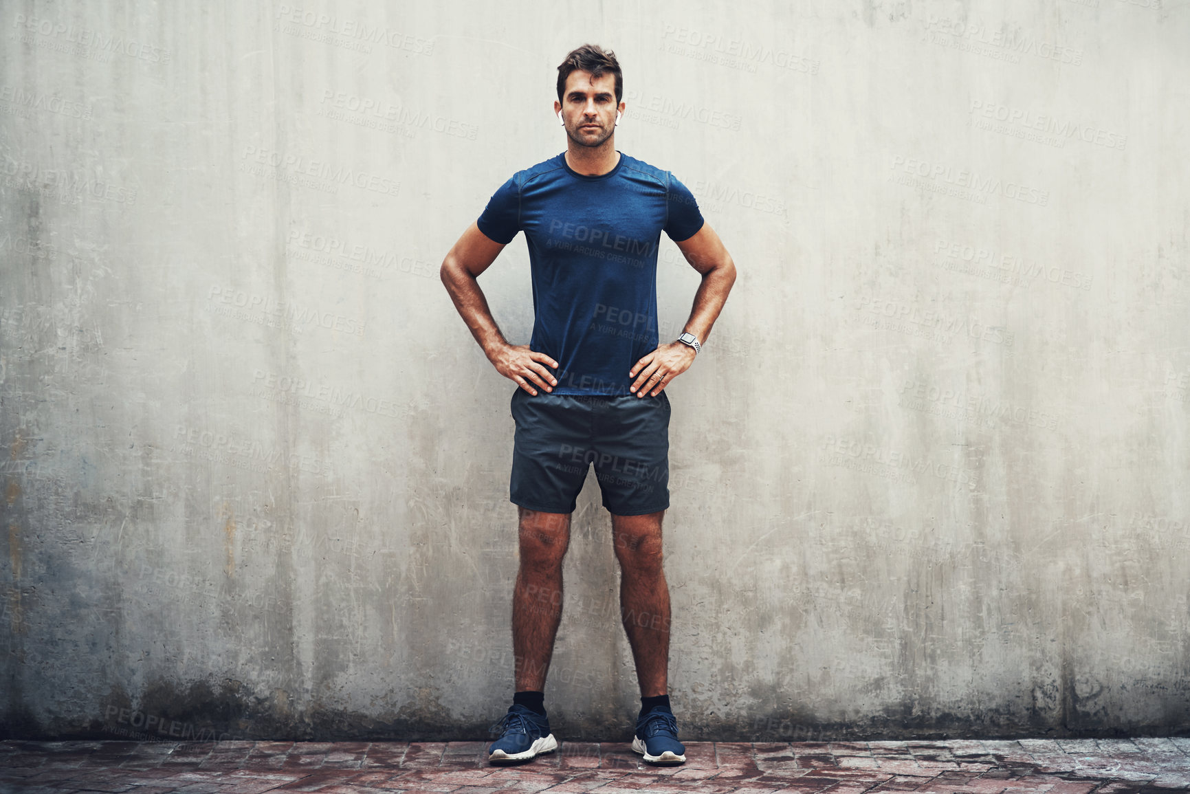 Buy stock photo Ready, runner or portrait of man by wall background for fitness training, outdoor workout or sports exercise. Wellness, mockup space and athlete with confidence for running, jogging or performance