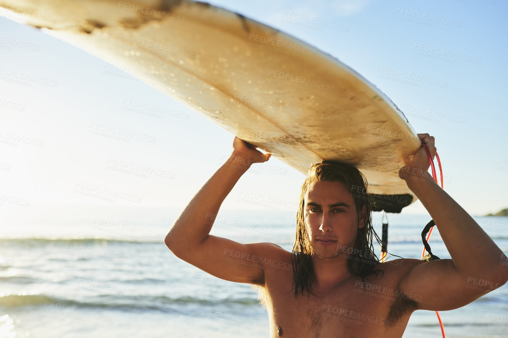 Buy stock photo Beach, man and surfer with surfboard on head for surfing as hobby or sports in Australia. Male person, ocean and recreation for fitness, exercise and training for tournament, competition and games