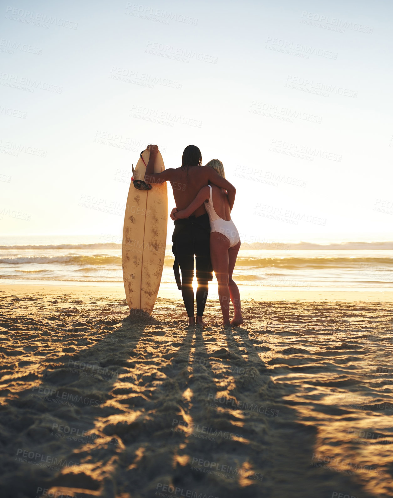 Buy stock photo Seaside, couple and hug with surfboard for love in bonding, break and memories in Australia. People, relationship and back view with sports for fitness, exercise and training with care and support