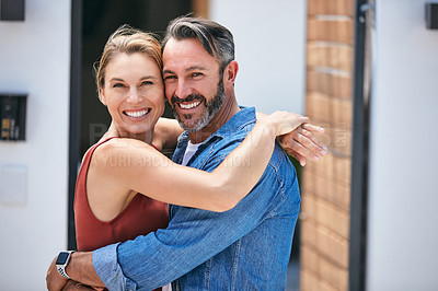 Buy stock photo Cropped portrait of an affectionate couple posing for a photograph outdoors