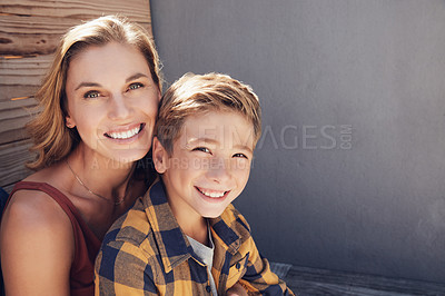 Buy stock photo Portrait of an adorable little boy spending quality time with his mother at home