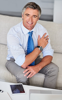 Buy stock photo Mature man, business and happy on sofa for remote work, research and communication with tablet. Company executive, portrait or smile on couch in home for networking, email and development with laptop