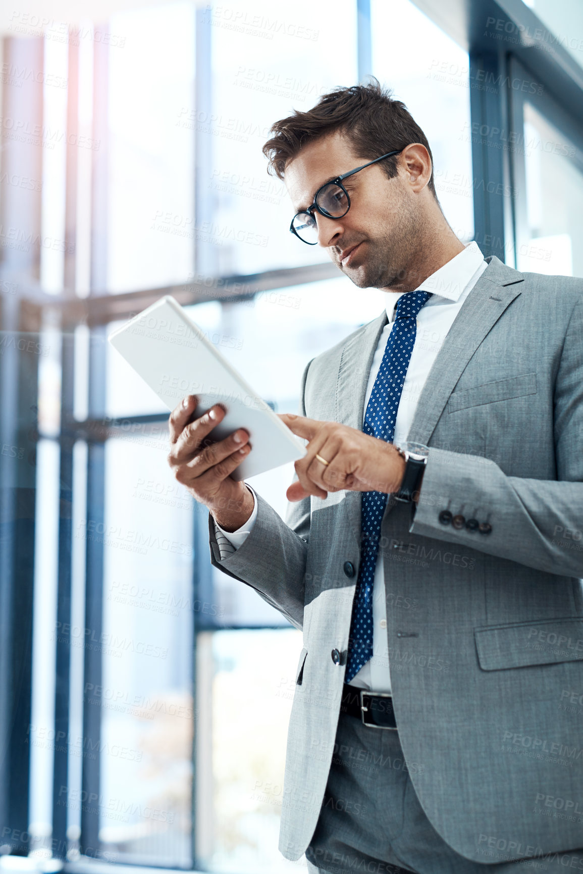 Buy stock photo Business, man and online with tablet in workplace for networking, client communication and legal research. Male paralegal, technology and internet for case management, document review and drafting.