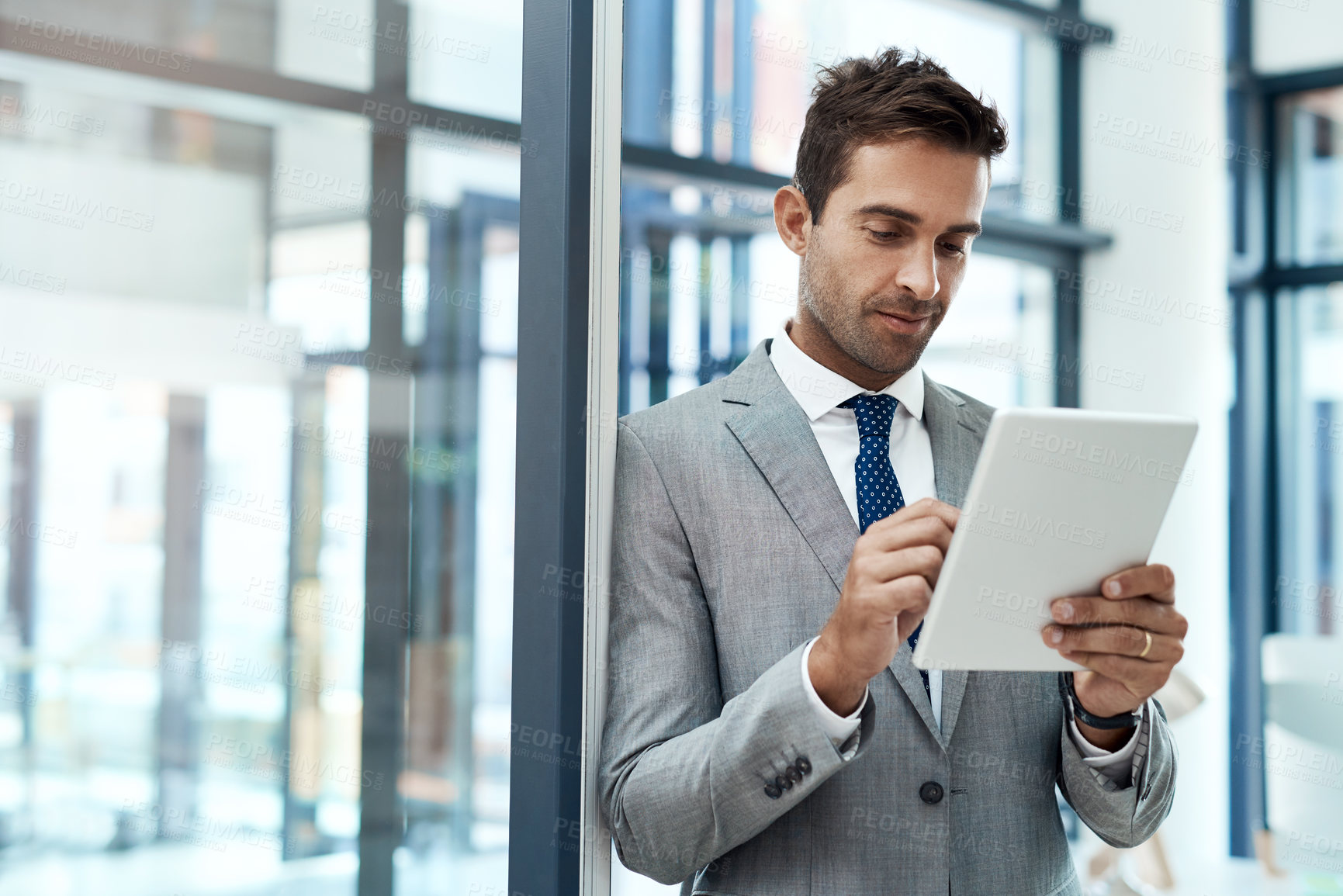 Buy stock photo Corporate, planning and tablet with business man in office, reading information online for research. App, internet and networking with confident employee in professional workplace for administration