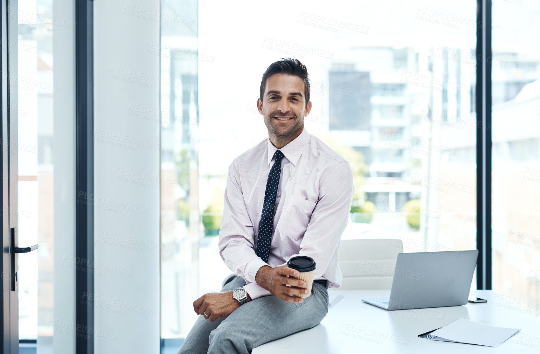 Buy stock photo Portrait, smile and business man with coffee to relax on office break at desk. Happy entrepreneur, professional and worker drinking tea beverage at table with insurance consultant at company in Spain