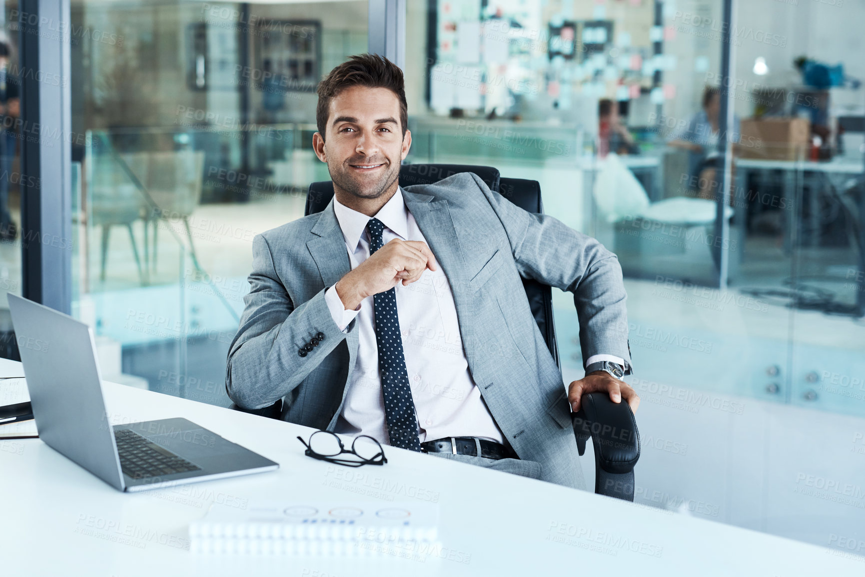 Buy stock photo Portrait of a businessman sitting at his desk