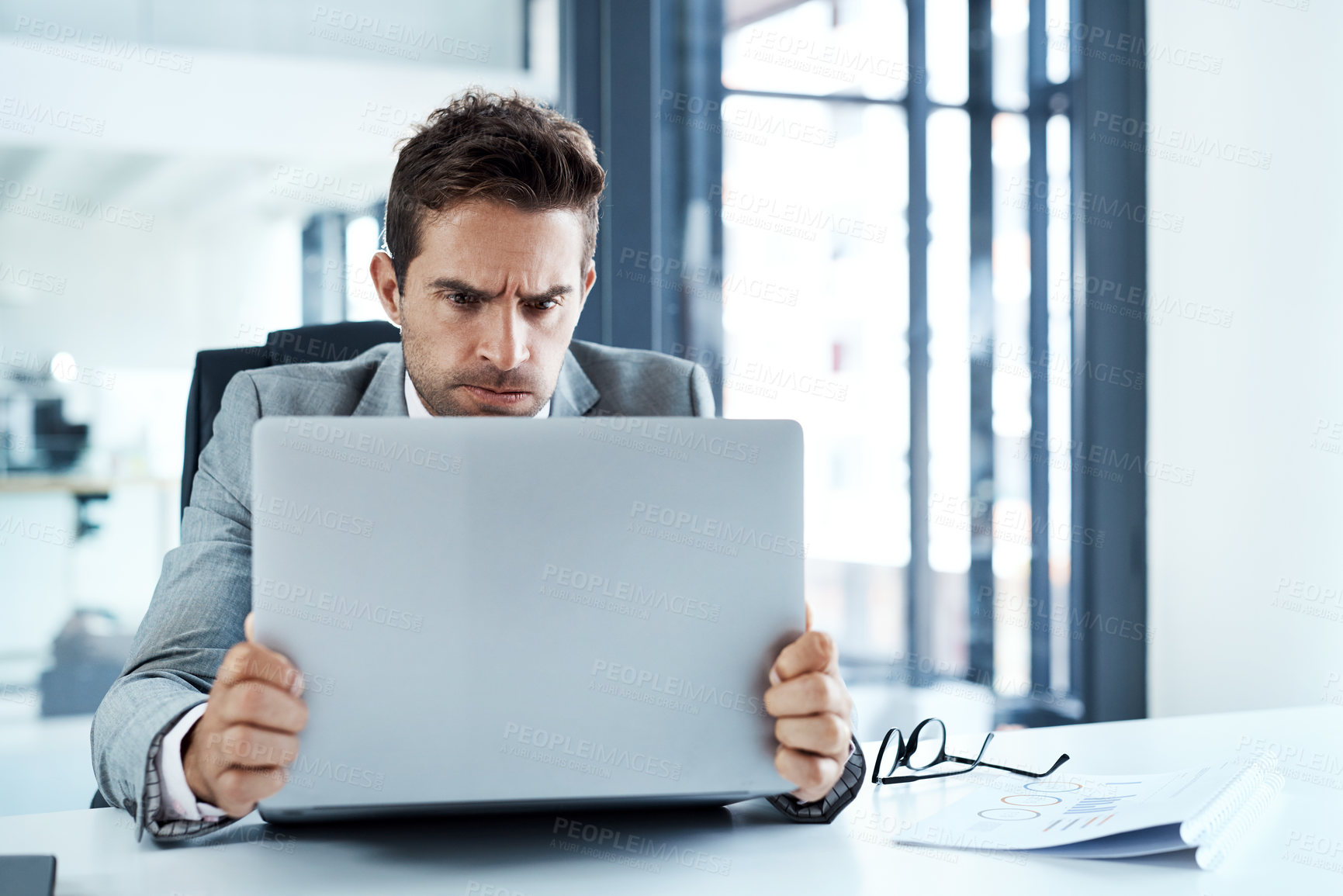 Buy stock photo Stress, angry and man on laptop in office frustrated with glitch, mistake or crisis. Anxiety, annoyed and male business person upset with fail, 404 and bad review, deadline report or tech problem