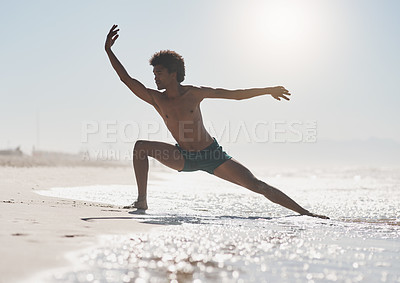 Buy stock photo Outdoor dance, body and black man on beach with stretching leg, muscle warm up and sunshine for summer vacation. African guy, dancing performance and move with sea holiday, energy and sand in Brazil