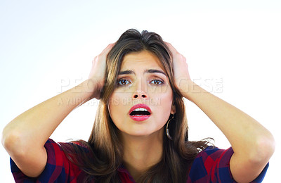Buy stock photo Shot of a young woman posing against a white background