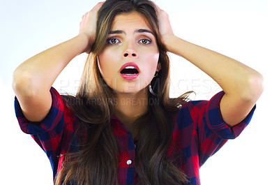 Buy stock photo Shot of a young woman posing against a white background