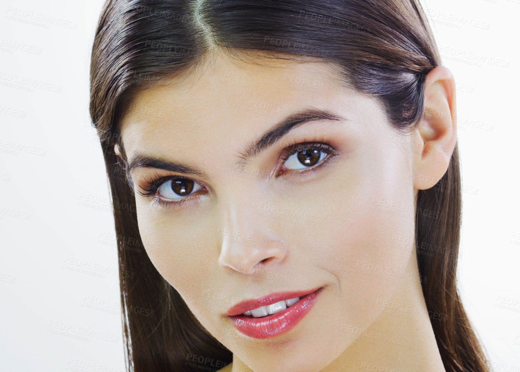 Buy stock photo Cropped shot of a beautiful young woman posing against a white background