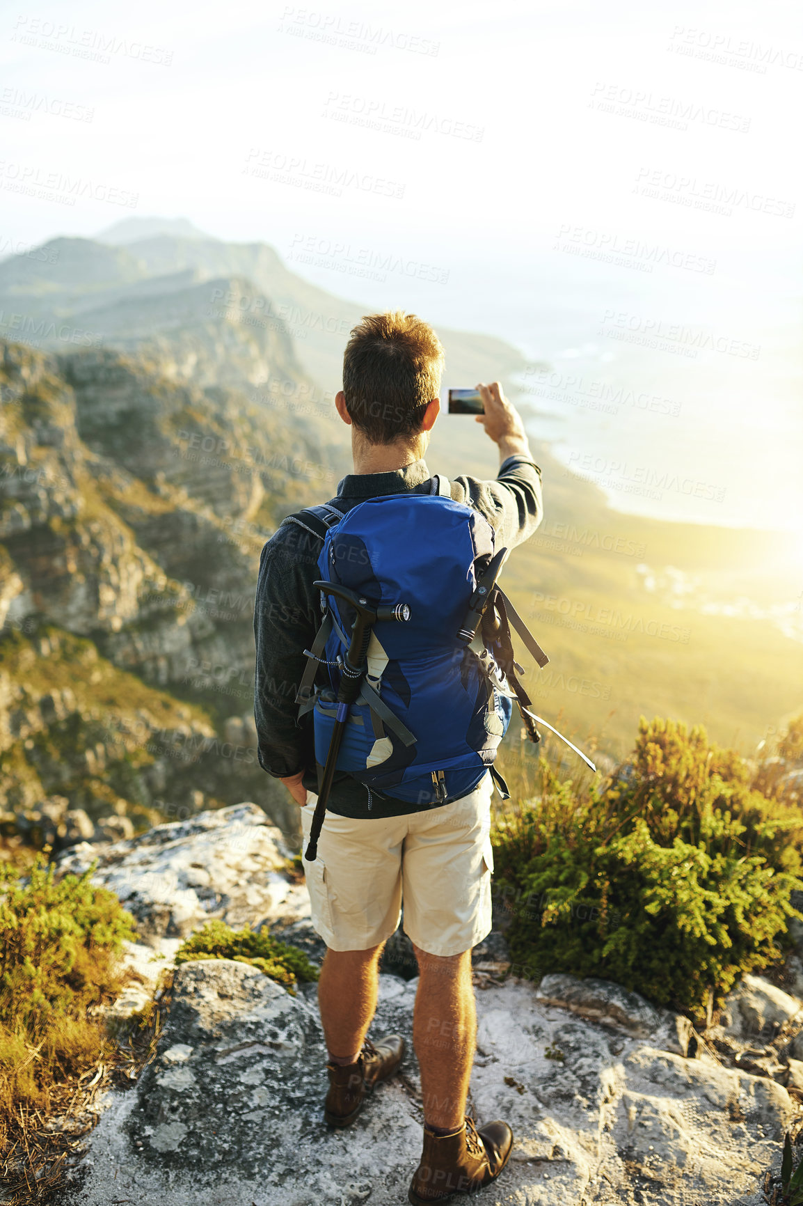 Buy stock photo Selfie, mountain and man with backpack, hiking and view with adventure, vacation and travel. Outdoor, hiker and healthy person with smartphone, social media and connection with internet and journey