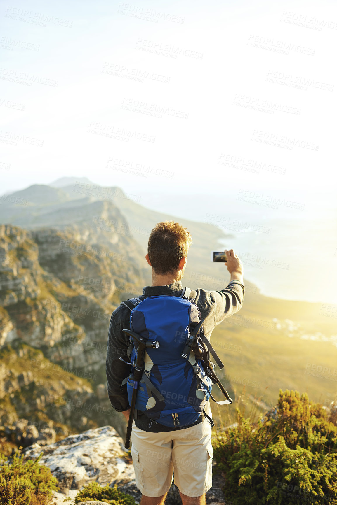 Buy stock photo Selfie, journey and man with backpack, hiking and view with adventure, vacation and travel. Outdoor, hiker and healthy person with smartphone, social media and connection with internet and mountain