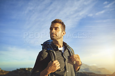 Buy stock photo Thinking, hiking and man on mountain with cloudy sky, achievement and sunset on holiday adventure. Nature, inspiration and hiker on cliff with backpack, calm scenery and outdoor vacation in France