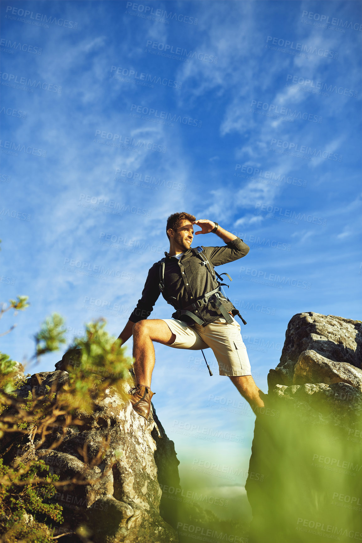 Buy stock photo Man, hiking and mountain with view outdoor for fitness adventure, sports challenge and travel health. Male person, backpack and vacation with trekking, balance and climbing exercise for explore trip
