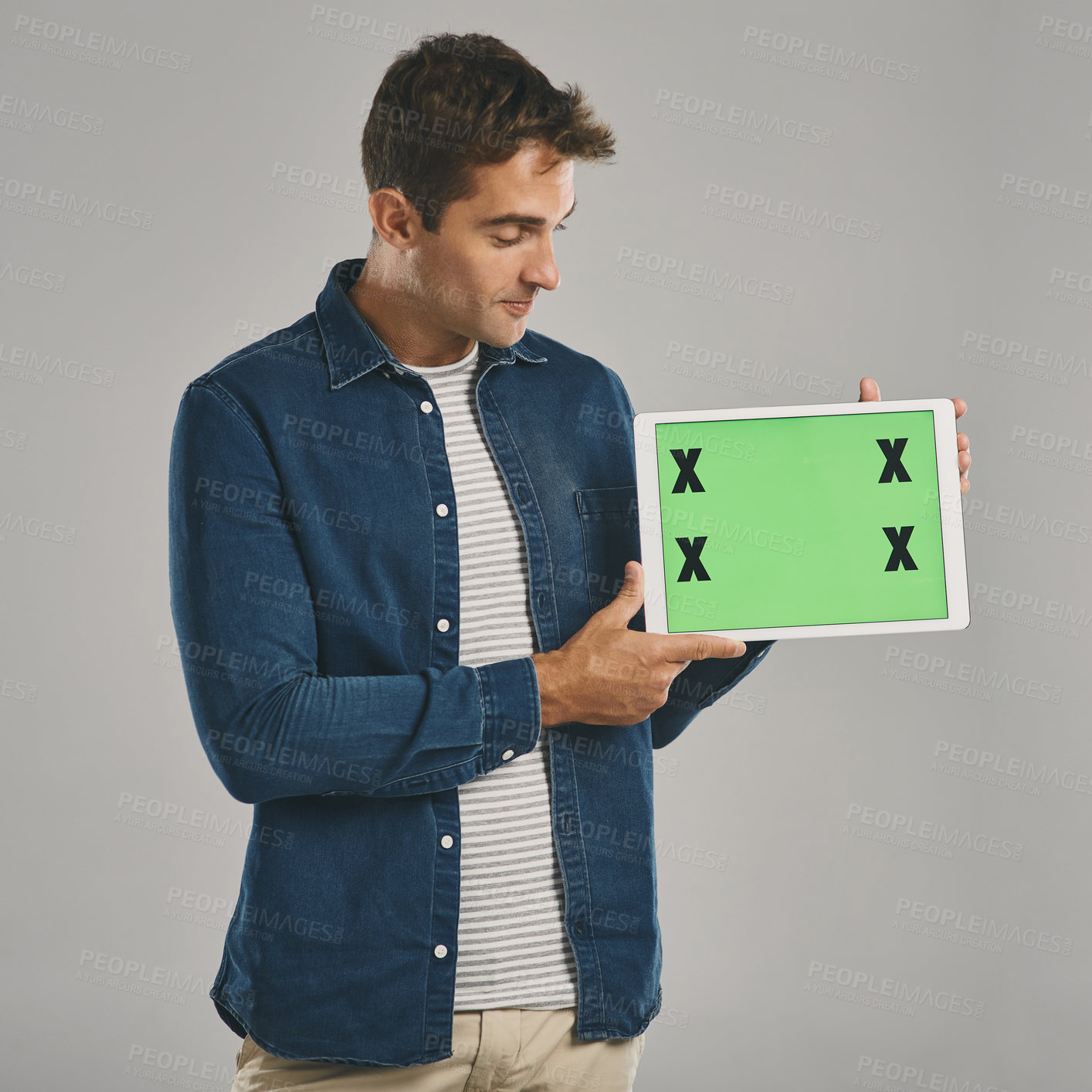 Buy stock photo Internet, green screen and man with tablet, network and person on gray studio background. Communication, opportunity or model with tech, tracking markers and promotion with digital app or connection