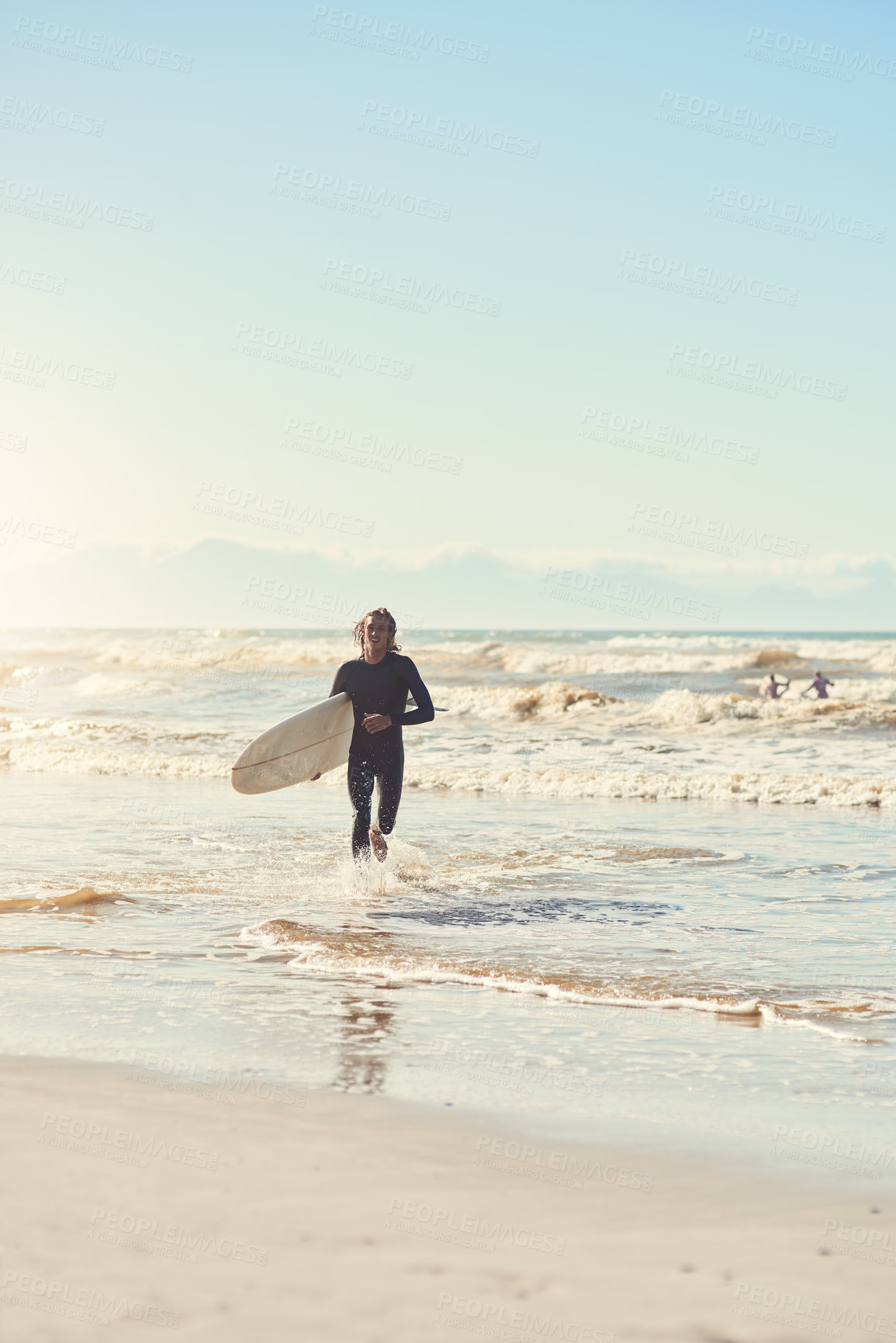 Buy stock photo Portrait, man and surfer running at sea on summer vacation, holiday and travel in California. Surfboard, person and beach for fitness, workout and exercise for water sport on blue sky mockup space