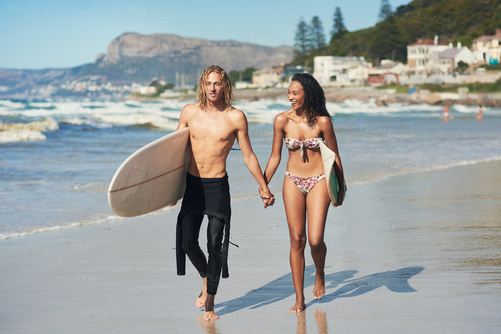 Buy stock photo Surfer couple, summer and walking on beach for holiday travel, sports activity and holding hands for care. Love, man and woman with board for surfing together, wellness and support in California