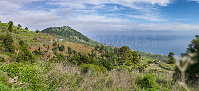 Buy stock photo Field, nature and sea with trail on mountain for hiking, adventure and environment with view. Explore, sustainability and peak with path of rural village for travel destination, grass and vacation