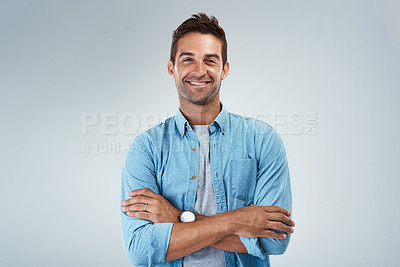 Buy stock photo Arms crossed, fashion and smile with portrait of man in studio on gray background for casual style. Confident, denim and shirt with happy model in clothes outfit for chilling, comfort or relax