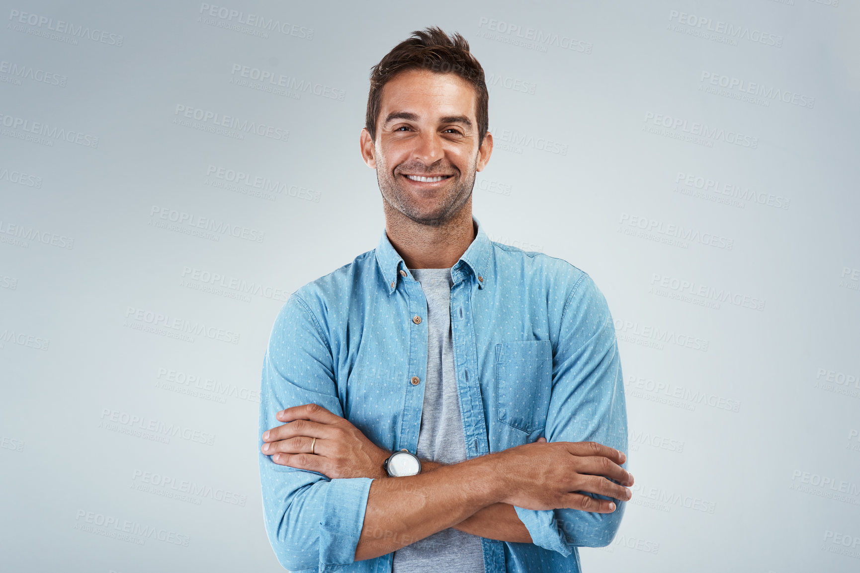 Buy stock photo Arms crossed, fashion and smile with portrait of man in studio on gray background for casual style. Confident, denim and shirt with happy model in clothes outfit for chilling, comfort or relax