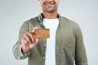 Buy stock photo Hand, happy person and holding credit card for payment offer, loan or invest isolated on white background. Debit, closeup or show plastic money for finance, budget or savings with bank account number