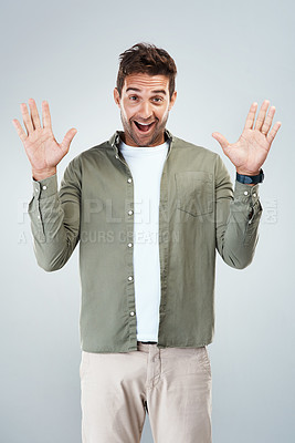 Buy stock photo Portrait of a surprised facial expression standing against a grey background