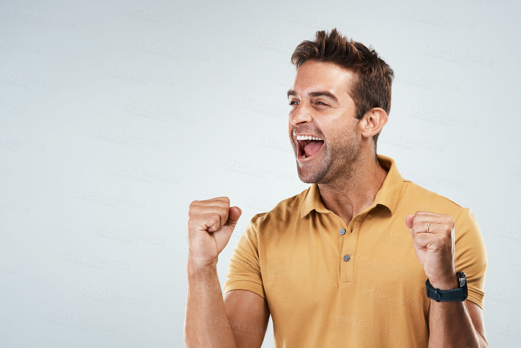 Buy stock photo Celebration, shouting and winner with fist of man in studio on white background for bonus or success. Achievement, cheering and smile with happy person screaming yes for goal, surprise or target