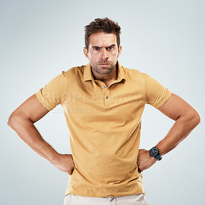 Buy stock photo Man, angry and portrait in studio with white background for conflict, fight and attitude problem. Male person, akimbo and annoyed on backdrop with upset, unhappy and frustrated body language for news