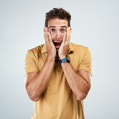 Buy stock photo Man, scared and hands in studio portrait, anxiety and suspense for announcement on white background. Male person, nervous and phobia for risk or panic for nightmare, information and paranoid terror