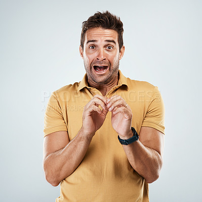 Buy stock photo Man, scared and terror in studio portrait, anxiety and suspense for announcement on white background. Male person, worry and phobia for risk or panic for nightmare, information and paranoid alarm