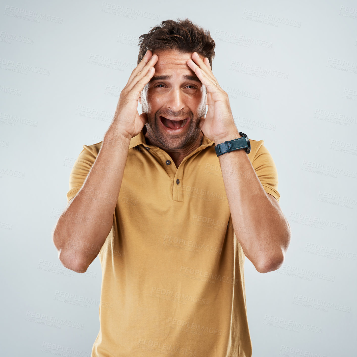 Buy stock photo Man, scared and scream in studio portrait, anxiety and suspense for announcement on white background. Male person, stress and phobia for risk or panic for nightmare, information and shout for terror