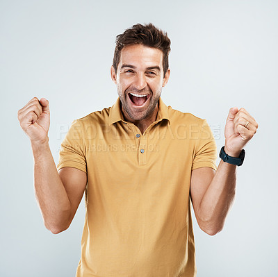 Buy stock photo Man, portrait and celebration for win in studio, excited and energy for success on white background. Male person, cheering and lottery prize or reward achievement, investment profit and promotion