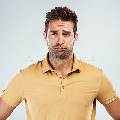 Buy stock photo Portrait, man and sad in studio with depression for fail, disaster or broken heart. Face, stress and unhappy model with anxiety and mental health challenge after breakup isolated on white background