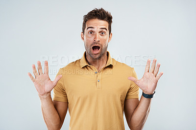 Buy stock photo Man, shock and gossip in studio portrait, rumor and suspense for announcement on white background. Male person, fake news and hands for wtf on information, nervous drama and surprise for conflict