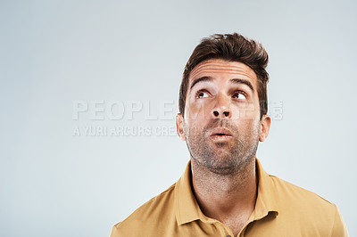 Buy stock photo Confused, man and idea in studio for solution, problem solving and unsure with space for question or answer. Male person, thoughts and thinking on white background with confusion, pensive and choice.