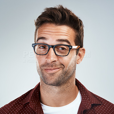 Buy stock photo Man, face and happy with eyeglasses in studio on white background with eyewear prescription for eyesight. Male person, smile and confident on portrait with frame for spectacles, lens and vision