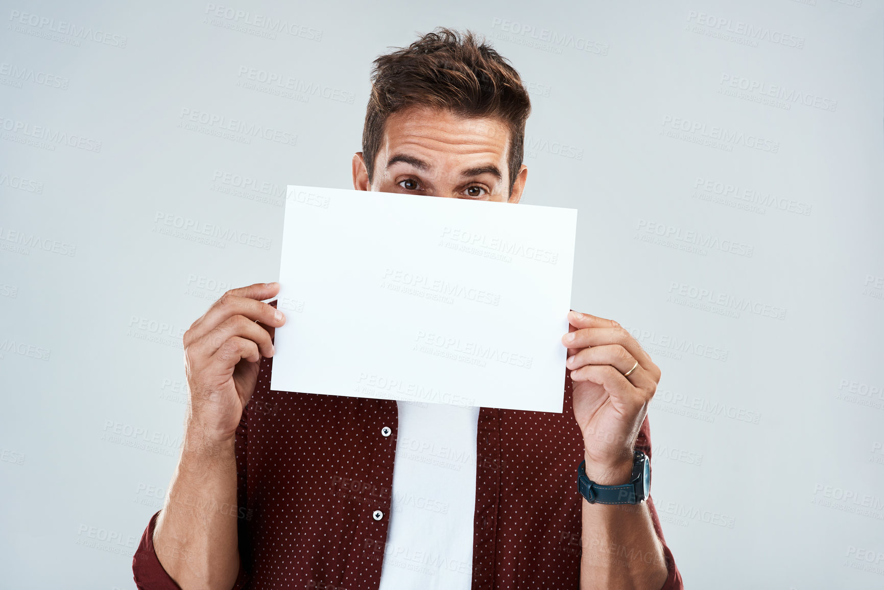 Buy stock photo Mockup, man and portrait with placard in studio for presenting ideas, creative pitch and advertising job opportunity. Male person, poster and white background with space for announcement and message.