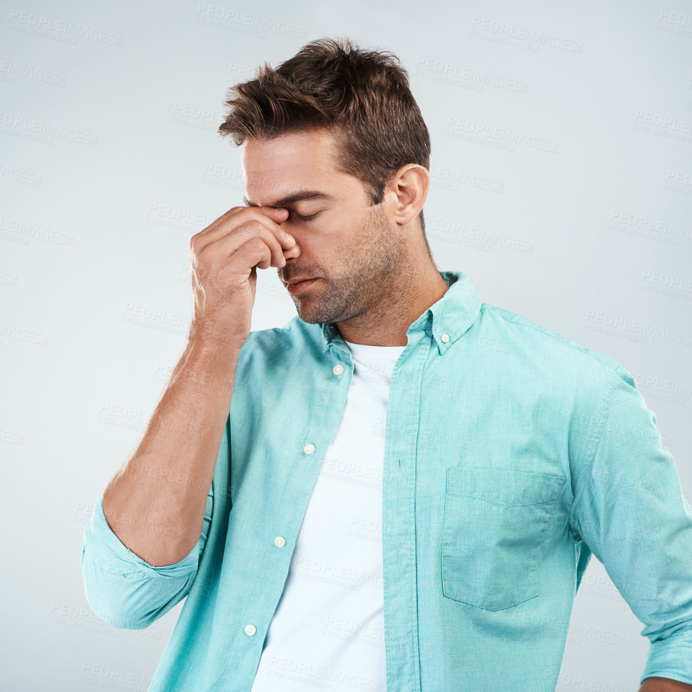 Buy stock photo Stress, frustrated and man with headache for health risk, pain and mistake for burnout in studio. Guy, temple massage and migraine for debt crisis, financial problem and brain fog by white background