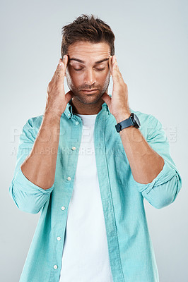 Buy stock photo Stress, temple massage and man with headache for health risk, burnout and frustrated in studio. Male person, pain and migraine for debt crisis, fail and fear of financial mistake by white background