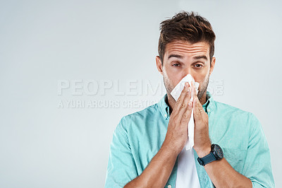 Buy stock photo Wipe nose, tissue and portrait of man in studio with flu allergy, sickness and virus on white background. Handkerchief, mockup space and face of male person for hayfever, cold and sneeze for sinus