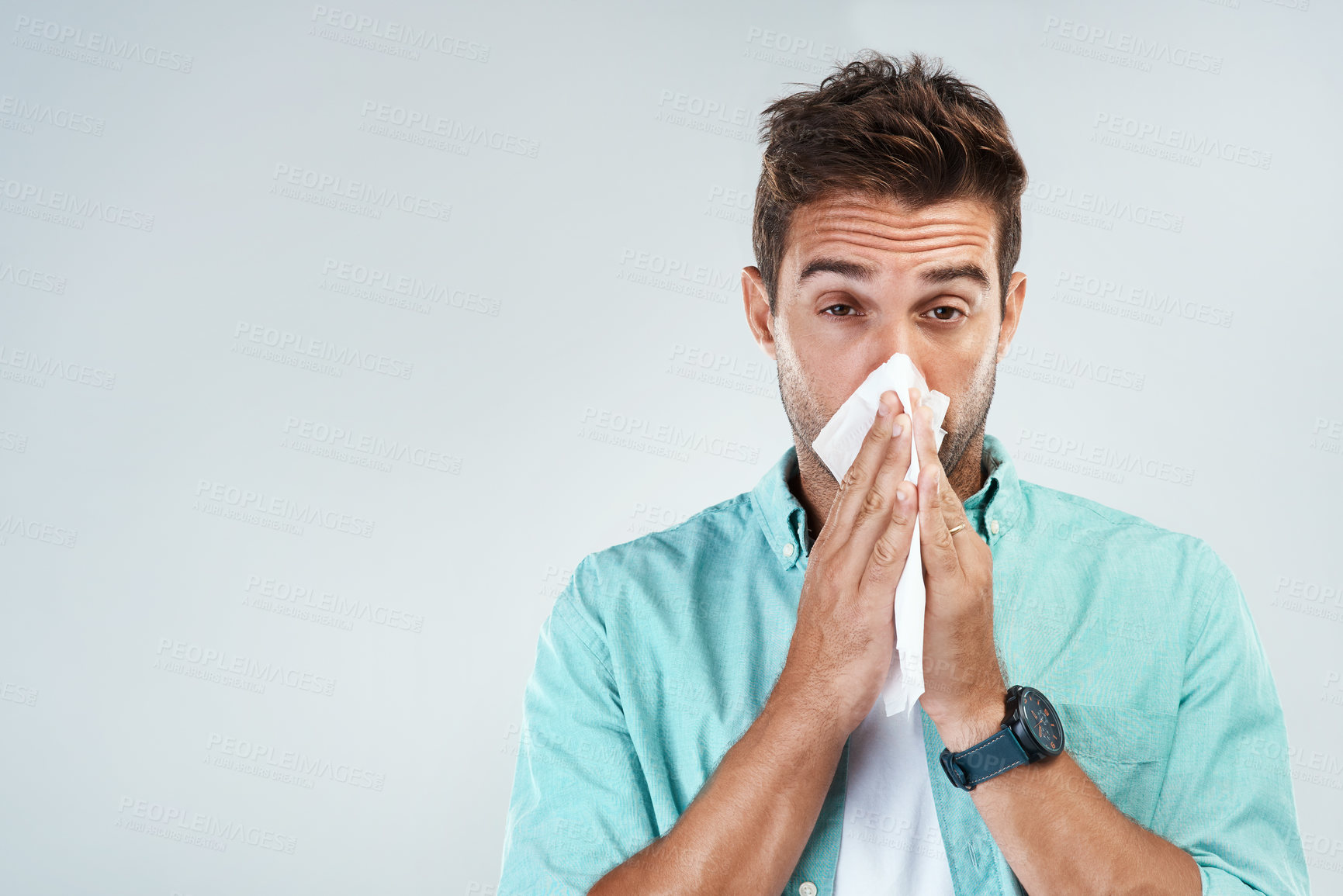 Buy stock photo Wipe nose, tissue and portrait of man in studio with flu allergy, sickness and virus on white background. Handkerchief, mockup space and face of male person for hayfever, cold and sneeze for sinus