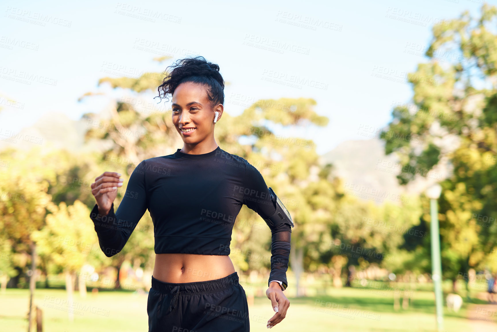 Buy stock photo Woman, park and smile with running for fitness with earphones for motivational music or audio in Atlanta. Female person, runner and happy or confident with exercise for health, wellness and self care