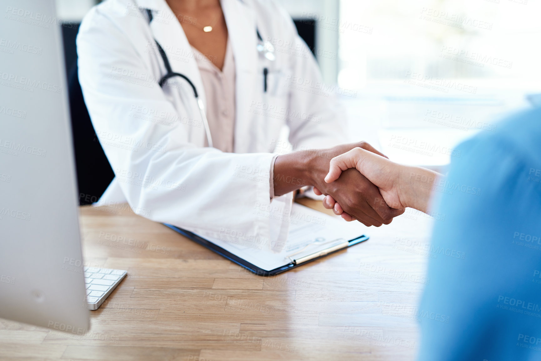 Buy stock photo Patient, doctor and meeting with handshake for insurance, agreement or appointment on medical aid at office. Closeup of person shaking hands with healthcare employee for health form or thank you